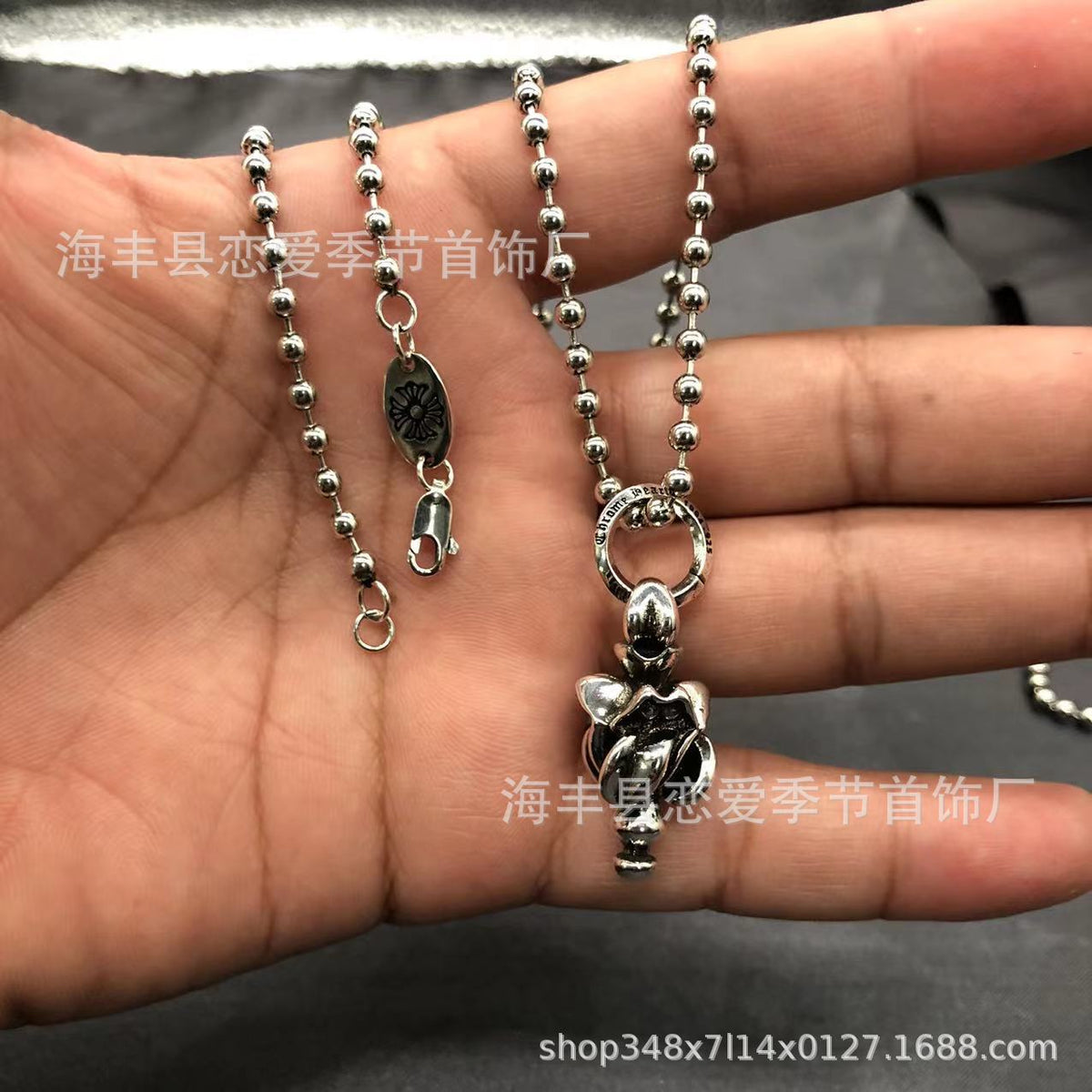 Chrome Hearts heart-shaped sword cross pendant